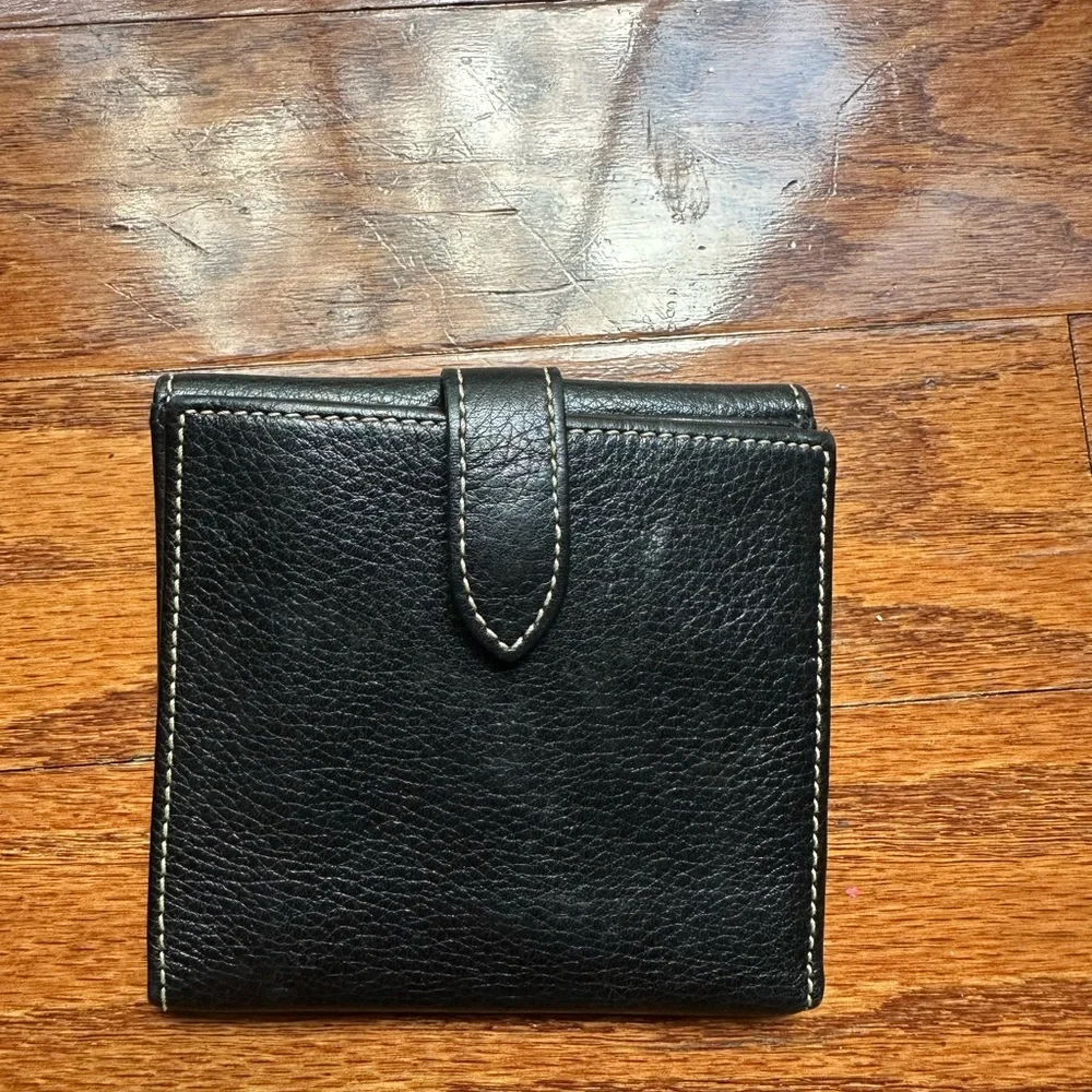 Dooney & Bourke pebble grain flap wallet a metal logo plate & contrast stitching